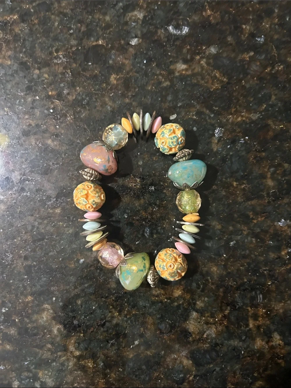 4 stretch bracelets and 1 stretch ring